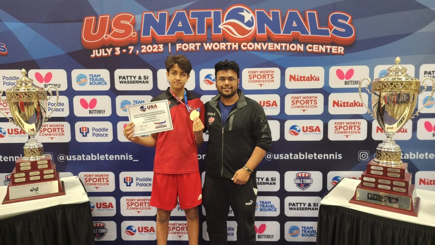Manant Kocher holding his gold medal and USATT certificate beside Subham Kundu at the 2023 U.S. National Championships in Fort Worth
